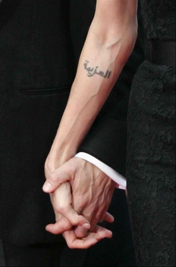 Angelina Jolie tattoo in Arabic