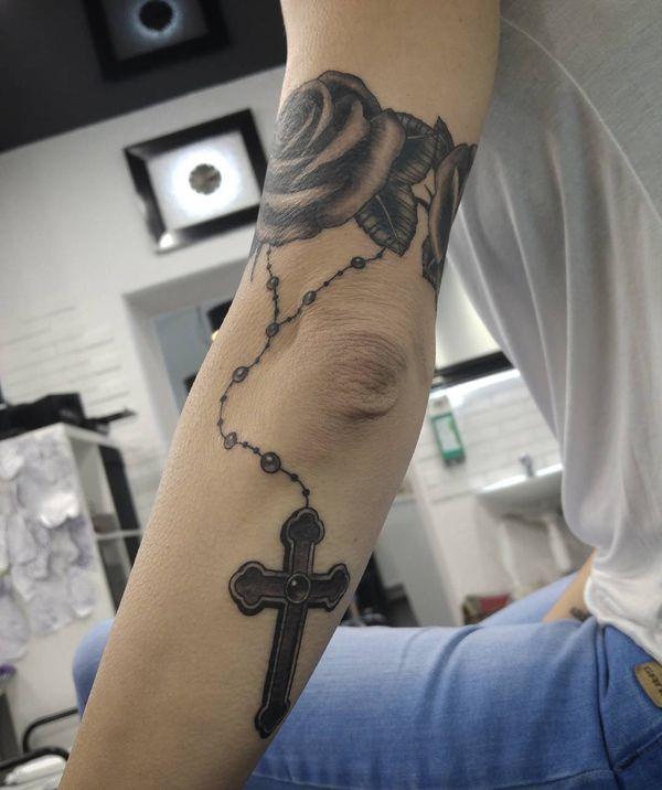 rosary tattoo.