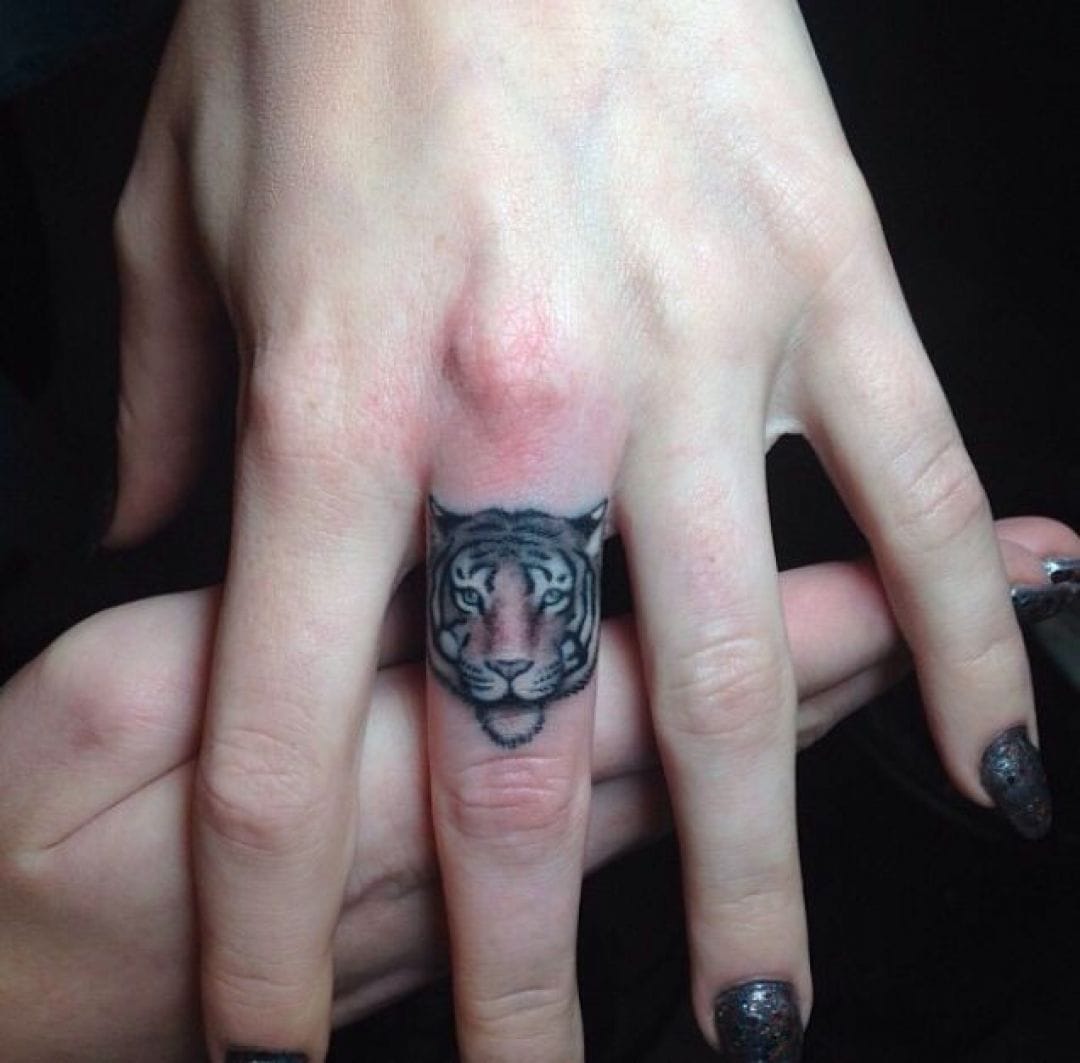 Tiger Face Finger Tattoo