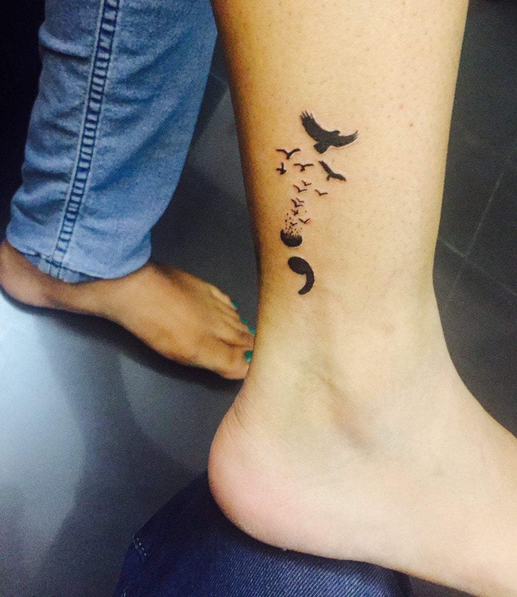 bird's semicolon tattoo