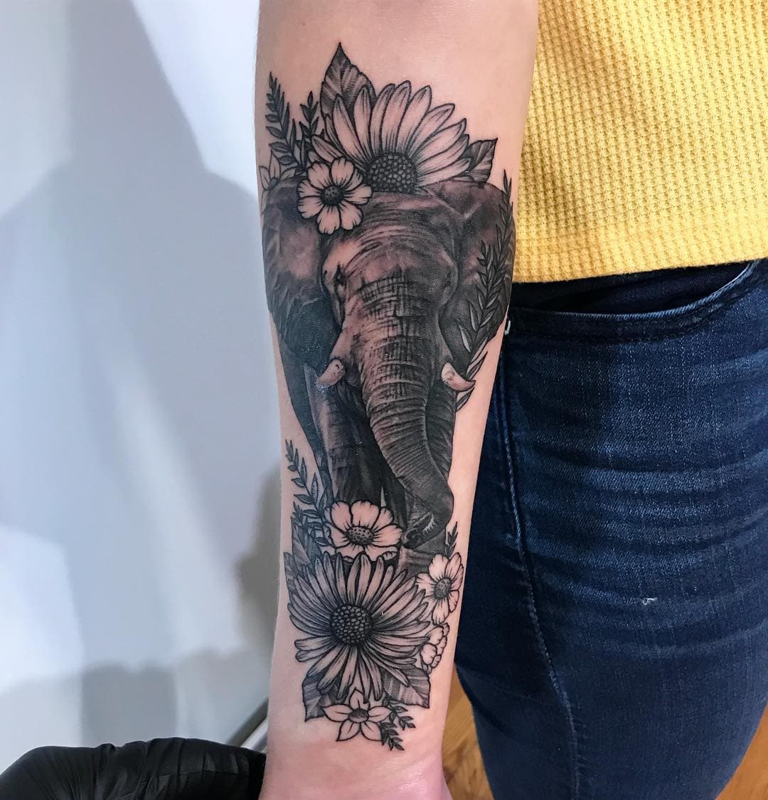 elephant tattoo arm