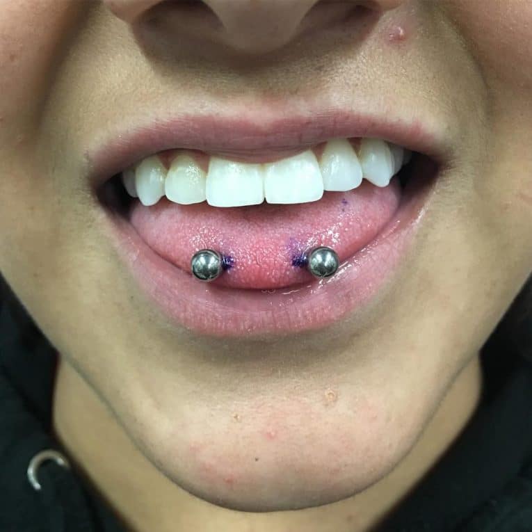 Of tongue ring meaning Tongue Piercing